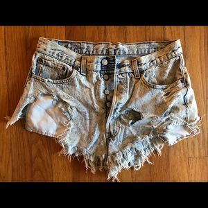Levi’s very distressed jean shorts